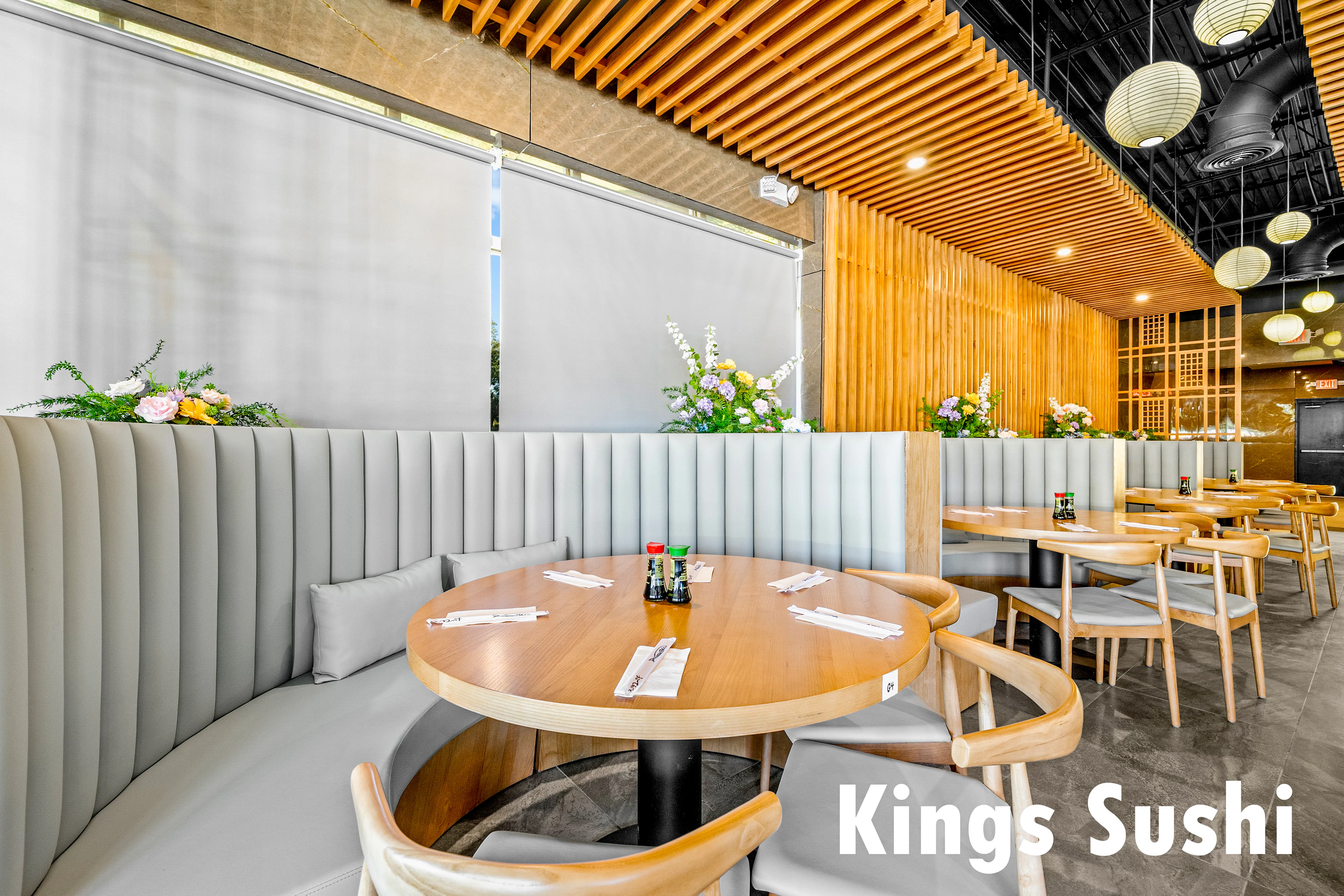 Floral-accented round booth seating at Kings Sushi, a Japanese Restaurant in Buford